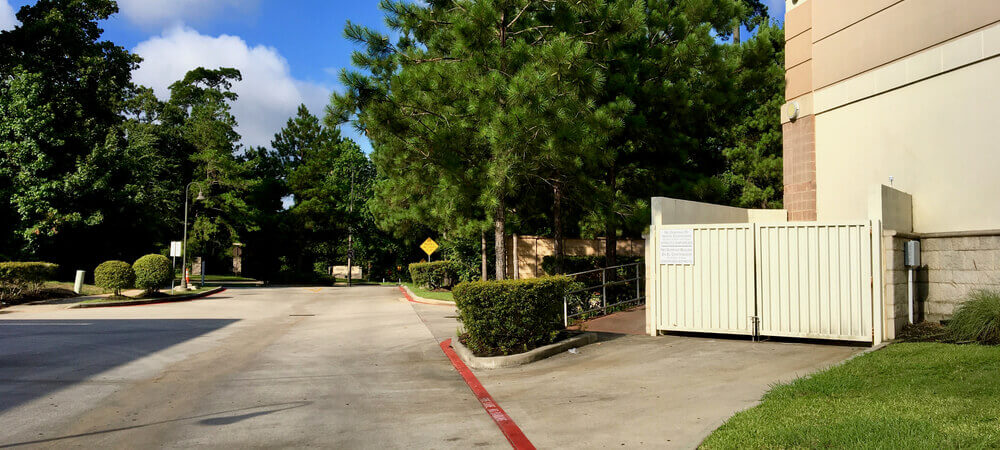 dumpster enclosure behind retail store