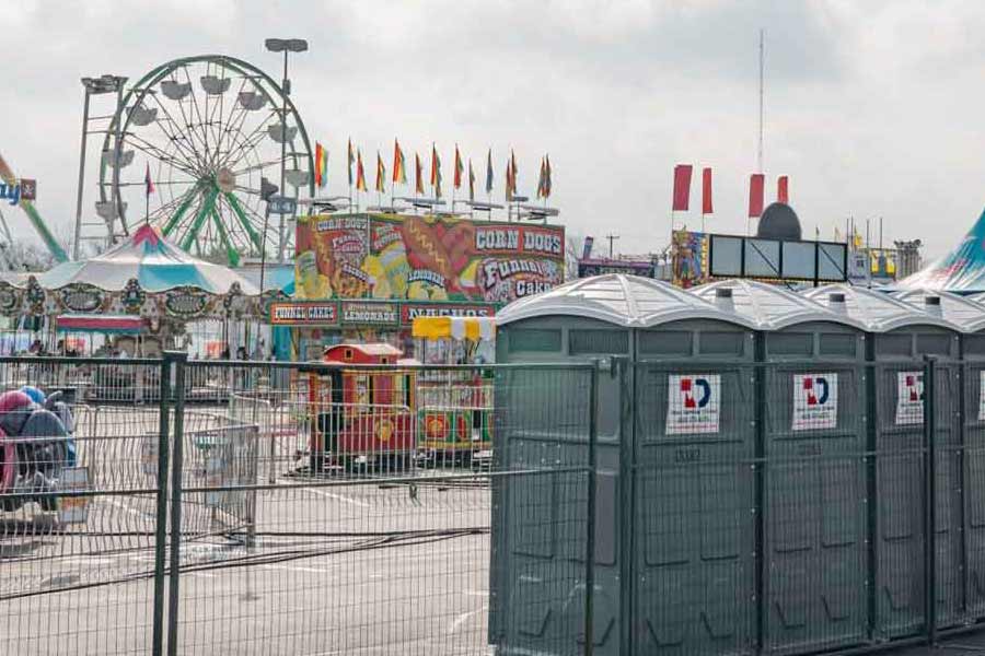 TDS portable restrooms or porta potties in a row at Rodeo Austin