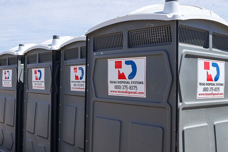 TDS portable restrooms or porta potties in a row